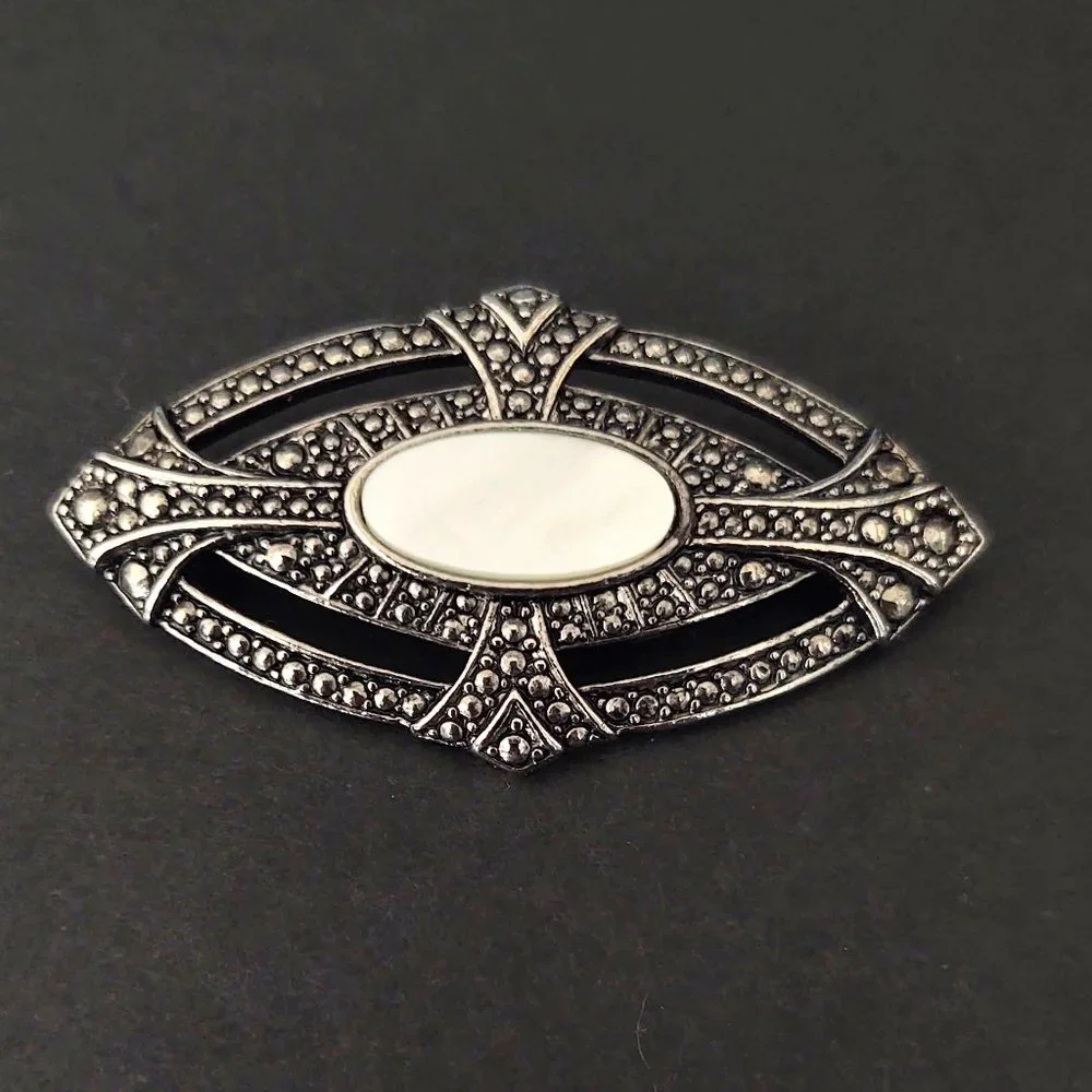 Textured silver and MOP brooch